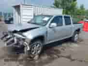 2011 Chevrolet Colorado 1LT z VIN 1GCHTCFEXB8131732, wystawiony jako IAAI lot #42595193 z przebiegiem 129 689 mil mil oraz . Historia ofert i sprzedaży dostępna na DreamBid. Obrazek 18.