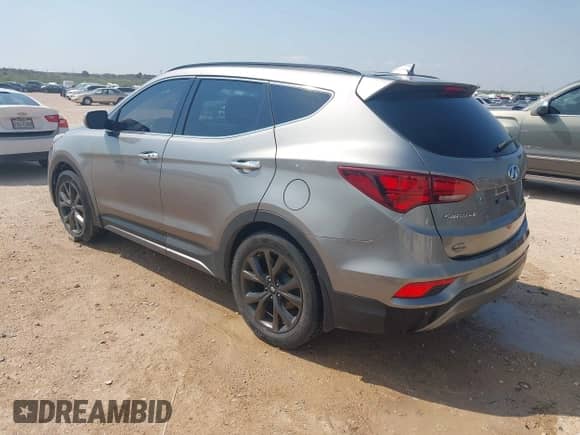 2017 Hyundai Santa Fe Ultimate with VIN 5NMZW4LA9HH047458, listed as a IAAI auction lot 43060284 with 102,219 mi miles and . Bid and sale history available at DreamBid. Image 3.