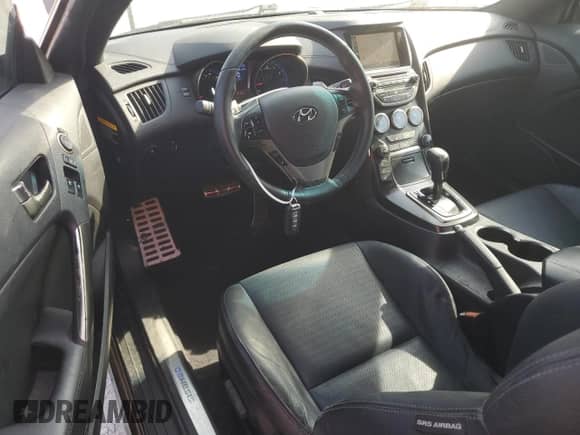 2016 Hyundai Genesis Coupe R-Spec с VIN KMHHU6KJ1GU137205, выставлен на аукционе Copart как лот 56864695 с пробегом 103 860 миль миль и Списание • Salvage title. История ставок и продаж доступна на DreamBid. Изображение 8.