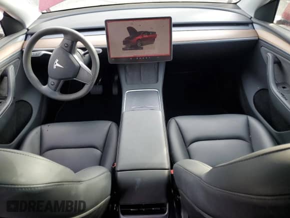 2023 Tesla Model Y Long Range z VIN 7SAYGDEE8PA113314, wystawiony jako Copart lot #80321355 z przebiegiem 15 710 mil mil oraz Szkoda całkowita • Salvage title. Historia ofert i sprzedaży dostępna na DreamBid. Obrazek 8.