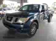 2015 Nissan Frontier SV with VIN 1N6AD0FV1FN742136, listed as a IAAI auction lot 43330683 with 130,630 mi miles and . Bid and sale history available at DreamBid. Image 2.