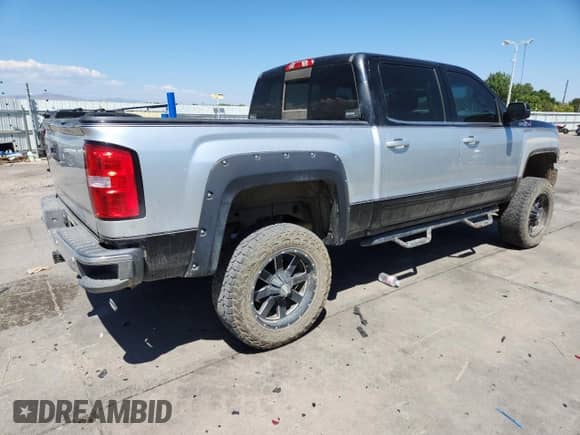 2015 GMC Sierra 1500 SLE z VIN 3GTU2UEC2FG232710, wystawiony jako Copart lot #68812915 z przebiegiem 119 685 mil mil oraz Szkoda całkowita • Salvage title. Historia ofert i sprzedaży dostępna na DreamBid. Obrazek 3.