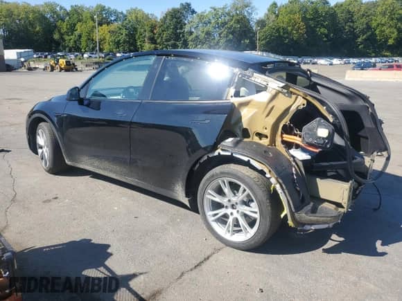 2021 Tesla Model Y Long Range z VIN 5YJYGDEEXMF068761, wystawiony jako Copart lot #71468415 z przebiegiem 50 709 mil mil oraz Szkoda całkowita • Salvage title. Historia ofert i sprzedaży dostępna na DreamBid. Obrazek 2.