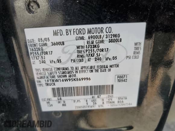 2005 Ford F-150 XLT with VIN 1FTRW14W95KE69996, listed as a Copart auction lot 81111205 with 128,926 mi miles and Salvage title. Bid and sale history available at DreamBid. Image 12.