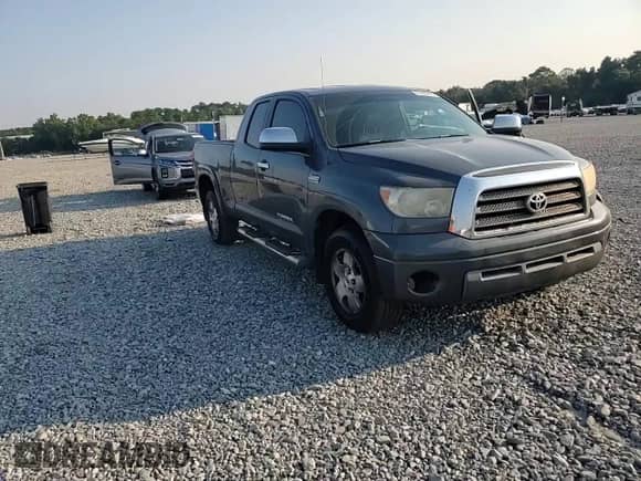 2007 Toyota Tundra Limited z VIN 5TBBV58147S454529, wystawiony jako Copart lot #81200615 z przebiegiem 414 725 mil mil oraz Szkoda całkowita • Salvage title. Historia ofert i sprzedaży dostępna na DreamBid. Obrazek 13.