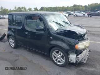 2009 Nissan Cube SL с VIN JN8AZ28R29T112680, выставлен на аукционе IAAI как лот 43222003 с пробегом 189 804 миль миль и . История ставок и продаж доступна на DreamBid. Изображение 1.