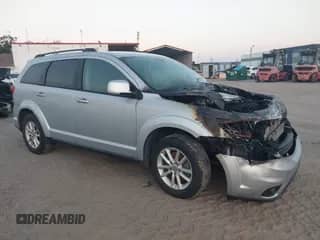 2014 Dodge Journey SXT with VIN 3C4PDCBGXET187188, listed as a IAAI auction lot 43275941 with Not provided miles and . Bid and sale history available at DreamBid. Image 1.