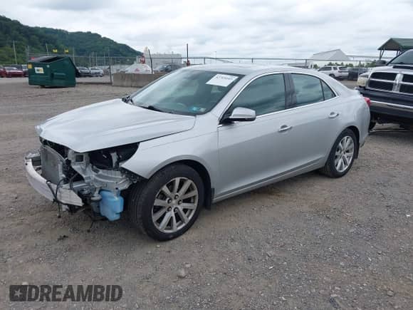 2014 Chevrolet Malibu LTZ with VIN 1G11H5SL6EF265598, listed as a IAAI auction lot 42769103 with 154,728 mi miles and . Bid and sale history available at DreamBid. Image 2.