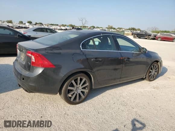 2015 Volvo S60 T6 Drive-E with VIN YV149MFK7F1343313, listed as a Copart auction lot 76279894 with 60,091 mi miles and Salvage title. Bid and sale history available at DreamBid. Image 3.