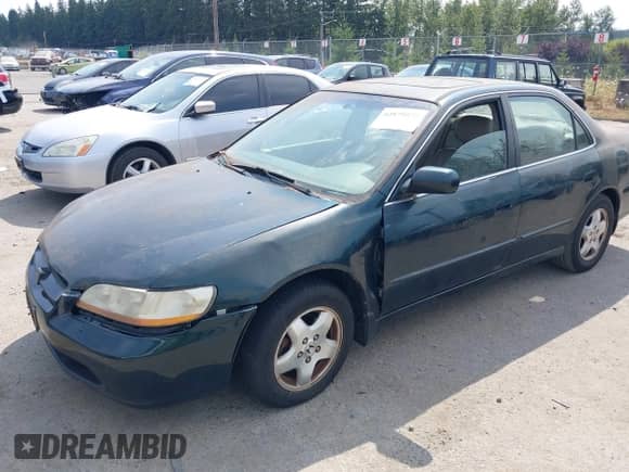 1998 Honda Accord EX z VIN 1HGCG1657WA041067, wystawiony jako IAAI lot #42879572 z przebiegiem Nie podano mil oraz . Historia ofert i sprzedaży dostępna na DreamBid. Obrazek 2.