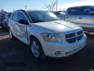 2009 Dodge Caliber SXT with VIN 1B3HB48C29D181709, listed as a IAAI auction lot 41425090 with 147,557 mi miles and . Bid and sale history available at DreamBid. Image 1.