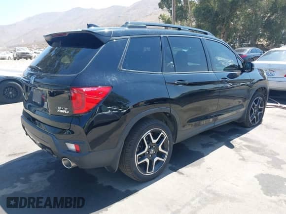 2023 Honda Passport Elite z VIN 5FNYF8H07PB015868, wystawiony jako IAAI lot #42673230 z przebiegiem 82 096 mil mil oraz . Historia ofert i sprzedaży dostępna na DreamBid. Obrazek 4.