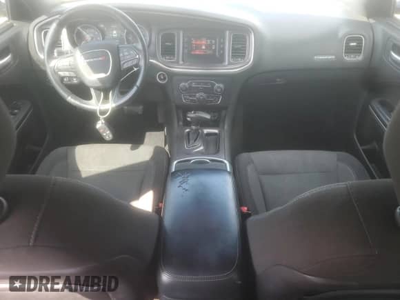 2015 Dodge Charger SE with VIN 2C3CDXBG0FH799419, listed as a Copart auction lot 84009815 with 180,797 mi miles and Salvage title. Bid and sale history available at DreamBid. Image 8.