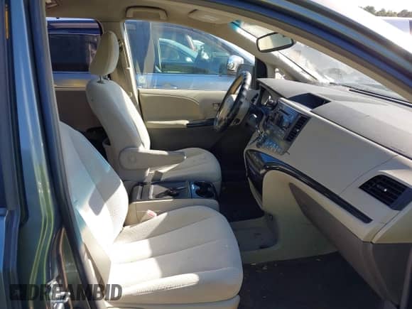 2014 Toyota Sienna LE AAS with VIN 5TDKK3DCXES414707, listed as a IAAI auction lot 43331233 with 299,915 mi miles and . Bid and sale history available at DreamBid. Image 5.