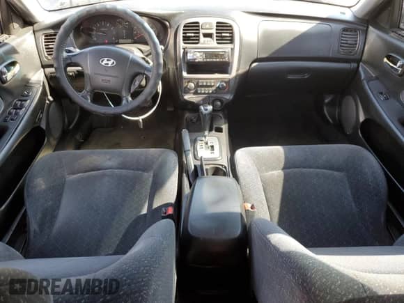 2003 Hyundai Sonata с VIN KMHWF25S43A729465, выставлен на аукционе Copart как лот 57914175 с пробегом 202 586 миль миль и Списание • Salvage title. История ставок и продаж доступна на DreamBid. Изображение 8.