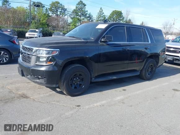2017 Chevrolet Tahoe with VIN 1GNLCDKCXHR240934, listed as a IAAI auction lot 41430391 with 167,428 mi miles and . Bid and sale history available at DreamBid. Image 17.