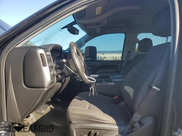 2015 Chevrolet Silverado 1500 LT z VIN 3GCUKREC7FG493960, wystawiony jako Copart lot #81196975 z przebiegiem Nie podano mil oraz Szkoda całkowita • Salvage title. Historia ofert i sprzedaży dostępna na DreamBid. Obrazek 7.