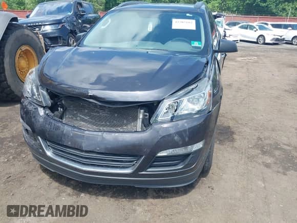 2015 Chevrolet Traverse LS z VIN 1GNKRFKD8FJ389076, wystawiony jako IAAI lot #42505182 z przebiegiem 151 621 mil mil oraz . Historia ofert i sprzedaży dostępna na DreamBid. Obrazek 6.