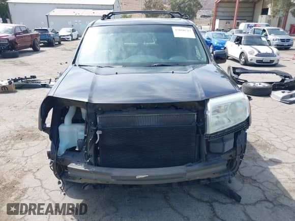 2013 Honda Pilot EX-L with VIN 5FNYF3H58DB019857, listed as a IAAI auction lot 43050717 with 152,188 mi miles and . Bid and sale history available at DreamBid. Image 13.