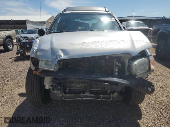 2002 Nissan Pathfinder SE z VIN JN8DR09Y82W707335, wystawiony jako Copart lot #64859935 z przebiegiem 147 468 mil mil oraz Szkoda całkowita • Salvage title. Historia ofert i sprzedaży dostępna na DreamBid. Obrazek 5.