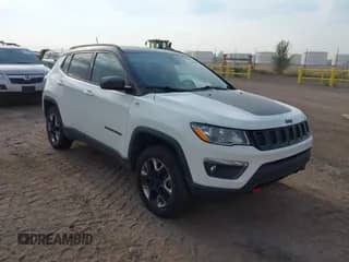 2018 Jeep Compass Trailhawk z VIN 3C4NJDDB8JT234574, wystawiony jako IAAI lot #43049041 z przebiegiem 93 968 mil mil oraz . Historia ofert i sprzedaży dostępna na DreamBid. Obrazek 1.