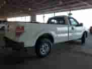 2014 Ford F-150 XL with VIN 1FTMF1CM1EKG23661, listed as a Copart auction lot 84188185 with 149,400 mi miles and Salvage title. Bid and sale history available at DreamBid. Image 3.