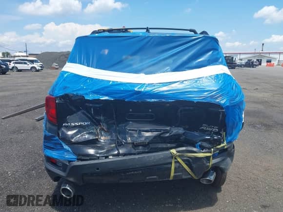 2023 Honda Passport Elite z VIN 5FNYF8H01PB030270, wystawiony jako IAAI lot #42667744 z przebiegiem 7 931 mil mil oraz . Historia ofert i sprzedaży dostępna na DreamBid. Obrazek 16.