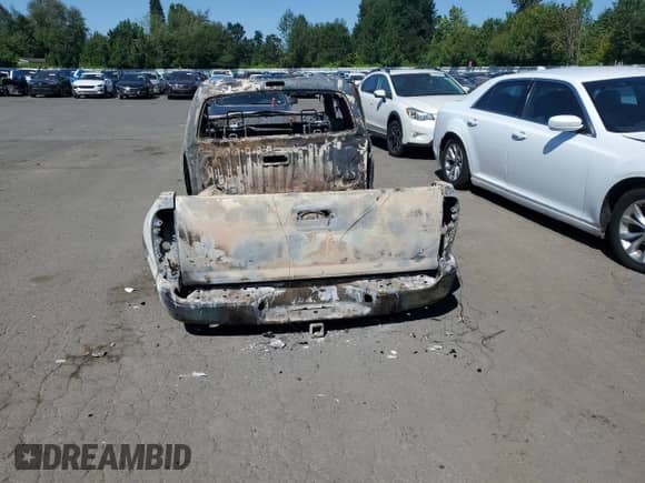 2014 Toyota Tacoma с VIN 5TFUU4EN4EX085067, выставлен на аукционе Copart как лот 62264825 с пробегом Не указан миль и Списание • Salvage title. История ставок и продаж доступна на DreamBid. Изображение 6.