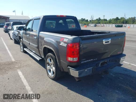 2011 GMC Sierra 1500 SLE z VIN 3GTP1VE06BG313943, wystawiony jako IAAI lot #43412577 z przebiegiem Nie podano mil oraz . Historia ofert i sprzedaży dostępna na DreamBid. Obrazek 3.