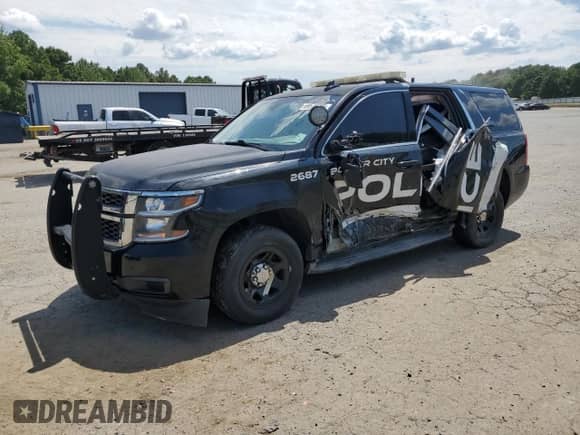 2015 Chevrolet Tahoe Commercial с VIN 1GNLC2EC8FR513897, выставлен на аукционе Copart как лот 69575935 с пробегом 122 512 миль миль и Списание • Salvage title. История ставок и продаж доступна на DreamBid. Изображение 1.