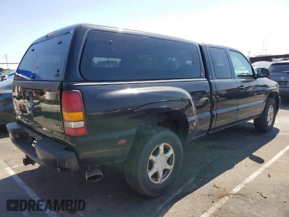 2002 GMC Sierra 1500 Denali z VIN 2GTFK69U821391080, wystawiony jako Copart lot #48396695 z przebiegiem 150 922 mil mil oraz Czysty tytuł • Clean title. Historia ofert i sprzedaży dostępna na DreamBid. Obrazek 3.