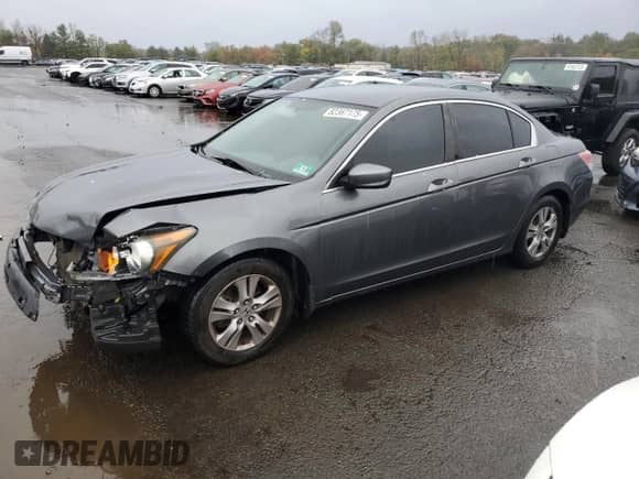 2012 Honda Accord SE z VIN 1HGCP2F66CA129988, wystawiony jako Copart lot #82367175 z przebiegiem 173 234 mil mil oraz Czysty tytuł • Clean title. Historia ofert i sprzedaży dostępna na DreamBid. Obrazek 1.