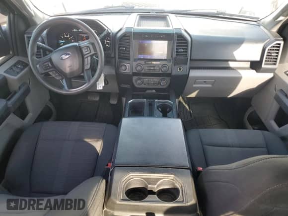 2020 Ford F-150 XL with VIN 1FTEW1CPXLFA15710, listed as a Copart auction lot 61944055 with 98,561 mi miles and Salvage title. Bid and sale history available at DreamBid. Image 8.