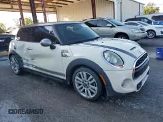 2017 MINI Hardtop Cooper S with VIN WMWXP7C56H3B93694, listed as a Copart auction lot 62015025 with 92,191 mi miles and Salvage title. Bid and sale history available at DreamBid. Image 4.