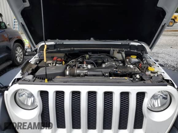 2023 Jeep Wrangler Sport S with VIN 1C4HJXAG6PW644372, listed as a Copart auction lot 58573085 with 38,704 mi miles and Clean title. Bid and sale history available at DreamBid. Image 12.