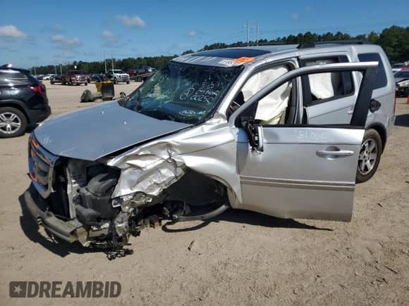 2009 Honda Pilot Touring with VIN 5FNYF38809B002505, listed as a Copart auction lot 61857065 with Not provided miles and Salvage title. Bid and sale history available at DreamBid. Image 1.