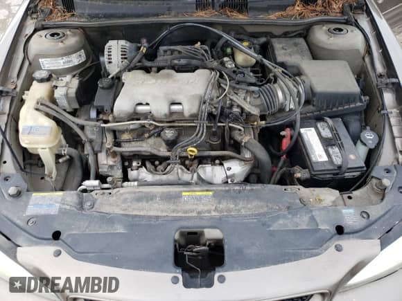 2002 Pontiac Grand Am SE1 z VIN 1G2NF52E12C292239, wystawiony jako Copart lot #61543075 z przebiegiem 162 050 mil mil oraz Szkoda całkowita • Salvage title. Historia ofert i sprzedaży dostępna na DreamBid. Obrazek 11.