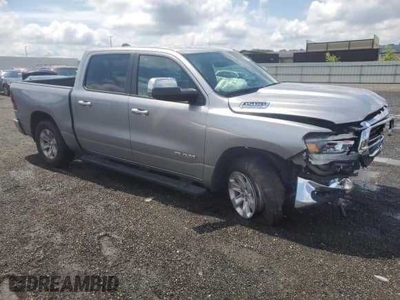 2023 Ram 1500 Laramie with VIN 1C6SRFJT3PN672357, listed as a Copart auction lot 63852845 with 55,570 mi miles and Salvage title. Bid and sale history available at DreamBid. Image 4.