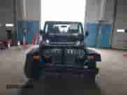 2005 Jeep Wrangler SE z VIN 1J4FA29195P358723, wystawiony jako IAAI lot #42158664 z przebiegiem 126 849 mil mil oraz . Historia ofert i sprzedaży dostępna na DreamBid. Obrazek 6.