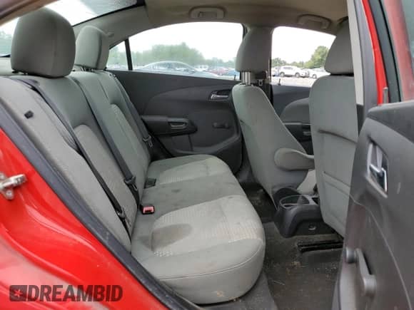 2014 Chevrolet Sonic LS z VIN 1G1JB5SH5E4161144, wystawiony jako Copart lot #69678114 z przebiegiem 152 052 mil mil oraz Szkoda całkowita • Salvage title. Historia ofert i sprzedaży dostępna na DreamBid. Obrazek 10.