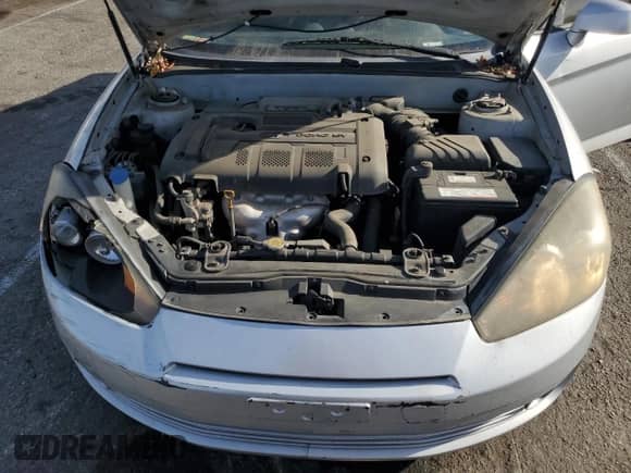 2008 Hyundai Tiburon GS с VIN KMHHM66DX8U291384, выставлен на аукционе Copart как лот 85974854 с пробегом 106 391 миль миль и Списание • Salvage title. История ставок и продаж доступна на DreamBid. Изображение 11.