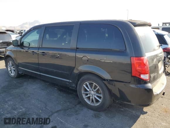 2013 Dodge Grand Caravan R/T with VIN 2C4RDGEG2DR810882, listed as a Copart auction lot 68159505 with 148,592 mi miles and Salvage title. Bid and sale history available at DreamBid. Image 2.