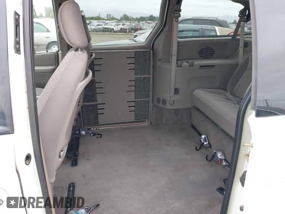 2003 Dodge Caravan Sport z VIN 2D4GP44L13R137970, wystawiony jako IAAI lot #42458333 z przebiegiem 63 431 mil mil oraz . Historia ofert i sprzedaży dostępna na DreamBid. Obrazek 8.