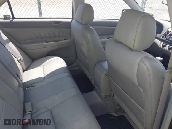 2002 Toyota Camry XLE с VIN 4T1BF32K82U019653, выставлен на аукционе IAAI как лот 43147237 с пробегом 26 002 миль миль и . История ставок и продаж доступна на DreamBid. Изображение 8.