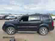 2014 Honda Pilot Touring with VIN 5FNYF3H97EB012774, listed as a IAAI auction lot 42724262 with 139,993 mi miles and . Bid and sale history available at DreamBid. Image 14.