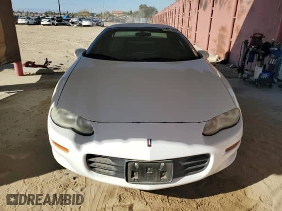 2002 Chevrolet Camaro z VIN 2G1FP22KX22104277, wystawiony jako Copart lot #73241054 z przebiegiem Nie podano mil oraz Czysty tytuł • Clean title. Historia ofert i sprzedaży dostępna na DreamBid. Obrazek 5.