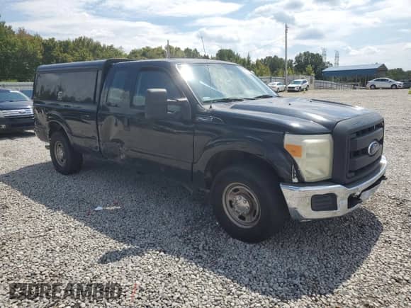 2013 Ford F-250 XL z VIN 1FT7X2A67DEA31361, wystawiony jako Copart lot #65064215 z przebiegiem 242 508 mil mil oraz Szkoda całkowita • Salvage title. Historia ofert i sprzedaży dostępna na DreamBid. Obrazek 4.