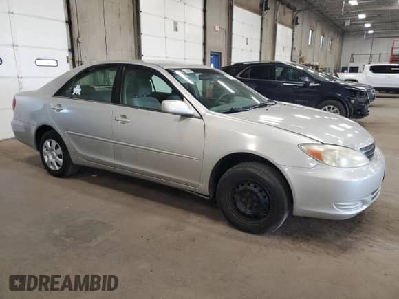 2004 Toyota Camry LE с VIN 4T1BE32K74U363867, выставлен на аукционе Copart как лот 80530065 с пробегом 217 036 миль миль и Списание • Salvage title. История ставок и продаж доступна на DreamBid. Изображение 4.