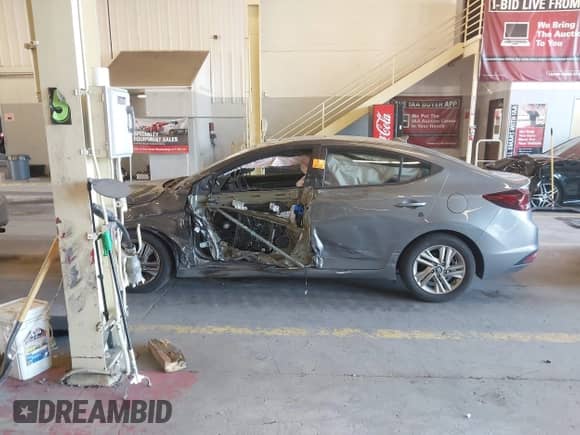 2019 Hyundai Elantra SEL z VIN 5NPD84LF1KH460453, wystawiony jako IAAI lot #42697097 z przebiegiem 24 926 mil mil oraz . Historia ofert i sprzedaży dostępna na DreamBid. Obrazek 13.