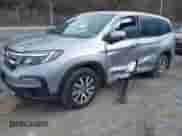 2021 Honda Pilot EX z VIN 5FNYF6H34MB029060, wystawiony jako IAAI lot #41719479 z przebiegiem 55 968 mil mil oraz . Historia ofert i sprzedaży dostępna na DreamBid. Obrazek 2.